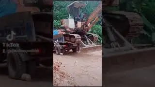 how to unloading backhoe