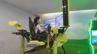 Watch a North Korean at an Arcade