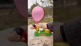 Blow up a balloon toy with your ass