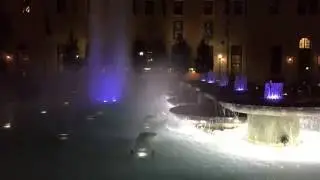 Mellon Square Park fountain and Omni William Penn Hotel at night
