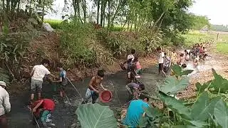 Fishing scene in rural canal