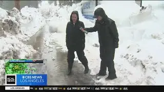 Trapped residents in San Bernardino Mountains see rain on top of snow
