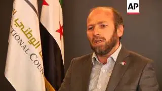 SYRIAN NATIONAL COUNCIL MEMBER REACTING TO HOULA MASSACRE