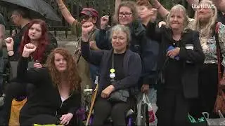 Joy Dove joins families and campaigners delivering John Pring's new book 'The Department' to MPs.