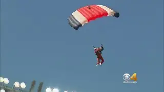 Skydivers Land In Broncos Stadium At Mile High