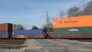 NS 8001 (GE ES44AC) leads NS 23G