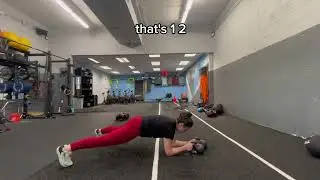 Double Kettlebell Alternating Plank Reach