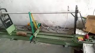 Textile roller balancing machine