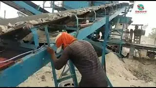 Automatic checker for stone crusher belt