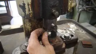 Hugo Kohl using Screw Presses to create a sterling silver money clip.