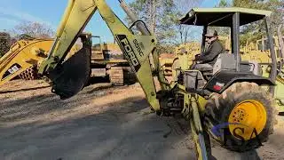 2121 - Ford 555C Tractor Backhoe will be sold at auction!