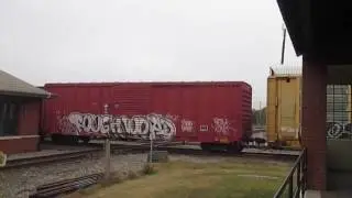 CSX Mixed Freight Crosses Diamond During Overcast Morning