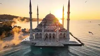 Mosque Reflections: Water, Light, and Flight