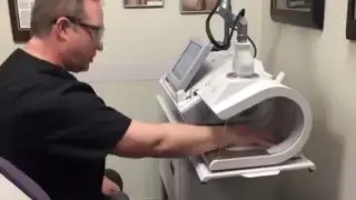 Dr. Spiegel testing out our new Rohrer Hand Laser