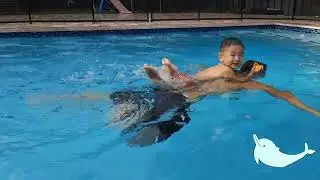 Daddy gave ET a dolphin ride 🐬