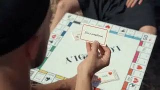 Romantic Board Game Date: A Couple's Sweet Moment Outdoors | Free Stock Video