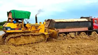 Interesting Bulldozer Operator Getting Heavy Truck Dumper Stuck Out Of Mud