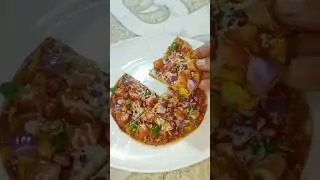 Roti pizza 🍕 on tawa | cheese pizza from leftover roti recipe 😋 #shorts #pizza #viralvideo