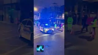 2 Police Cars Responding in Busy London