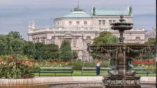 Volksgarten timelapse, or People Garden public green park with roses in Vienna of Austria.