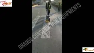 ORANGE road scarifying machine