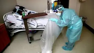 Cleaner in COVID wards proud to fight pandemic