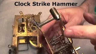 Clock Strike Hammer. Striking a gong, bell or chime rod with hammers.