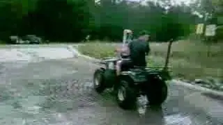 Chris Jones Sinks ATV into River