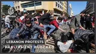 Protesters celebrate as Lebanon parliament session postponed