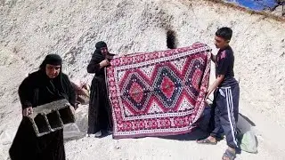 Videographer, helping grandmother and her child in mountain cave