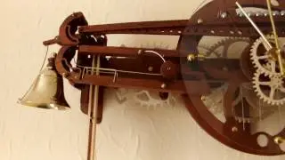 Marble strike clock using ball bearings