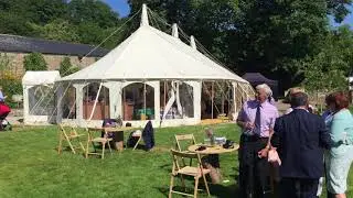 An outdoor wedding reception with live music at Pengenna Manor - Cornwall wedding venue