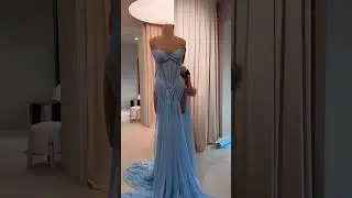 Share with a friend who would own the spotlight in this baby blue corset gown! To order, send us a