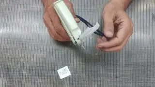 Tagging gun_Washerman (Laundry Associate)_Odia