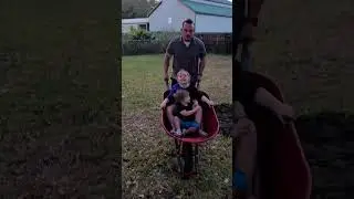Kids ride in a wheelbarrow #cute #wheelbarrow #hilarious #country