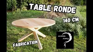 Une TABLE ronde sur trépied croisé