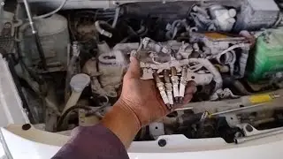 nissan sunny  intake manifold. spark plug replacement step by step 