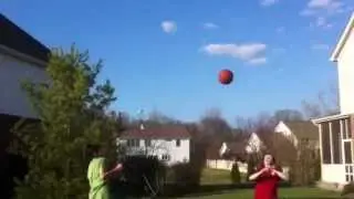Hitting water bottle with basketball
