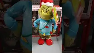 Gemmy animated Sidestepper Grinch in Ugly Sweater
