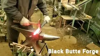 Black Butte Forge. Forging hand rail returns-
