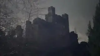 Exploring an abandoned castle at night 