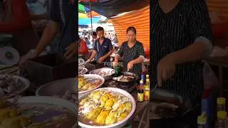Traditional Asian market cuisine: From basin to frying pan.@mujahid81-ai