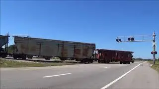 NS 3081 and NS 706 shove NS A12 across AL 20 in Courtland, AL with a Caboose Leading! (L-B&A)