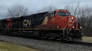 Canadian national eastbound M302 2938+3156+mid DPU 2931 Bancroft Michigan January 9 2026