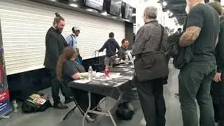 Danny John-Jules with John Barrowman and Craig Charles for fans at autograph signing table, 13-10-25