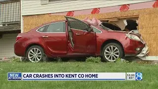 Car crashes into home in Plainfield Township
