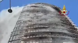 RAW VIDEO: Flames engulf high-rise apartments in Milan, Italy