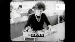 1960s UK, Women Working in Office, Mechanical Calculators, 16mm