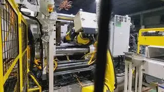 Product Handling Robot System with Mold Insert Integration-