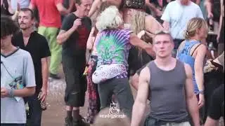 100 years old man dancing at psytrance festival wearing psychedelic clothing
